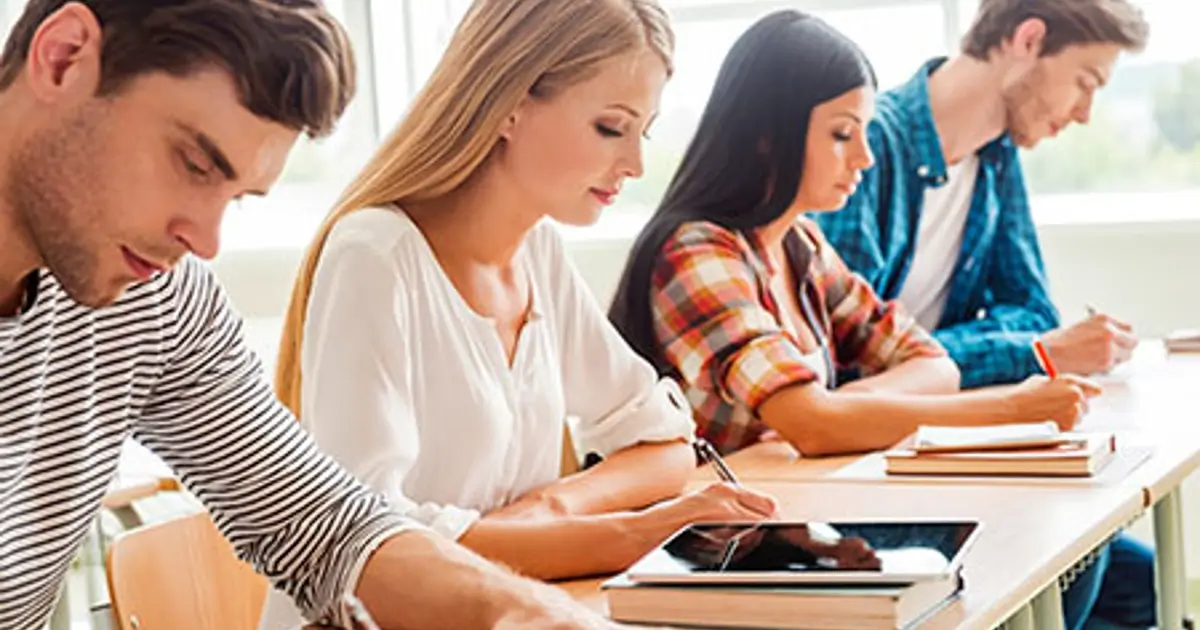 Students on a class, working on a task