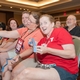 The audience at Mr. Mensa 2014. The image centers on a woman in a red shirt.